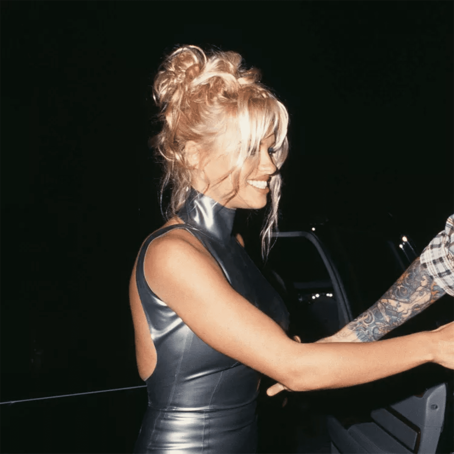 90年代的帕梅拉·安德森(Pamela Anderson)和她的帕姆高髻辫