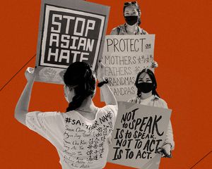 抗议者持有停止亚洲恨的迹象