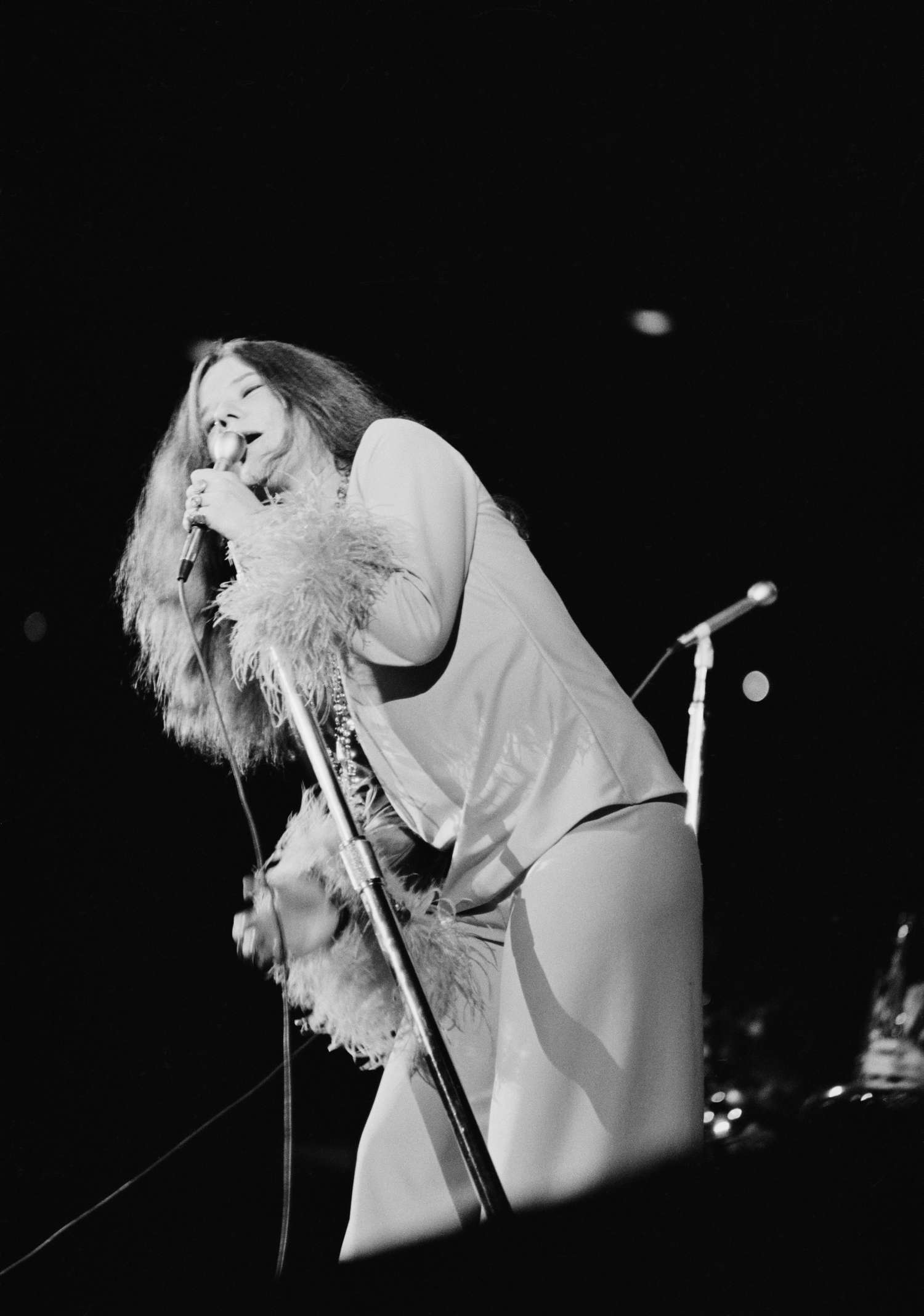 60年代时尚羽毛Janis Joplin